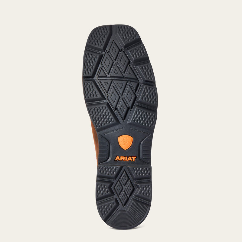 Close-up of 10021108 - Groundbreaker WSQ ST Boots Brown Boots showing Charcoal sole with orange shield logo and ARIAT text,