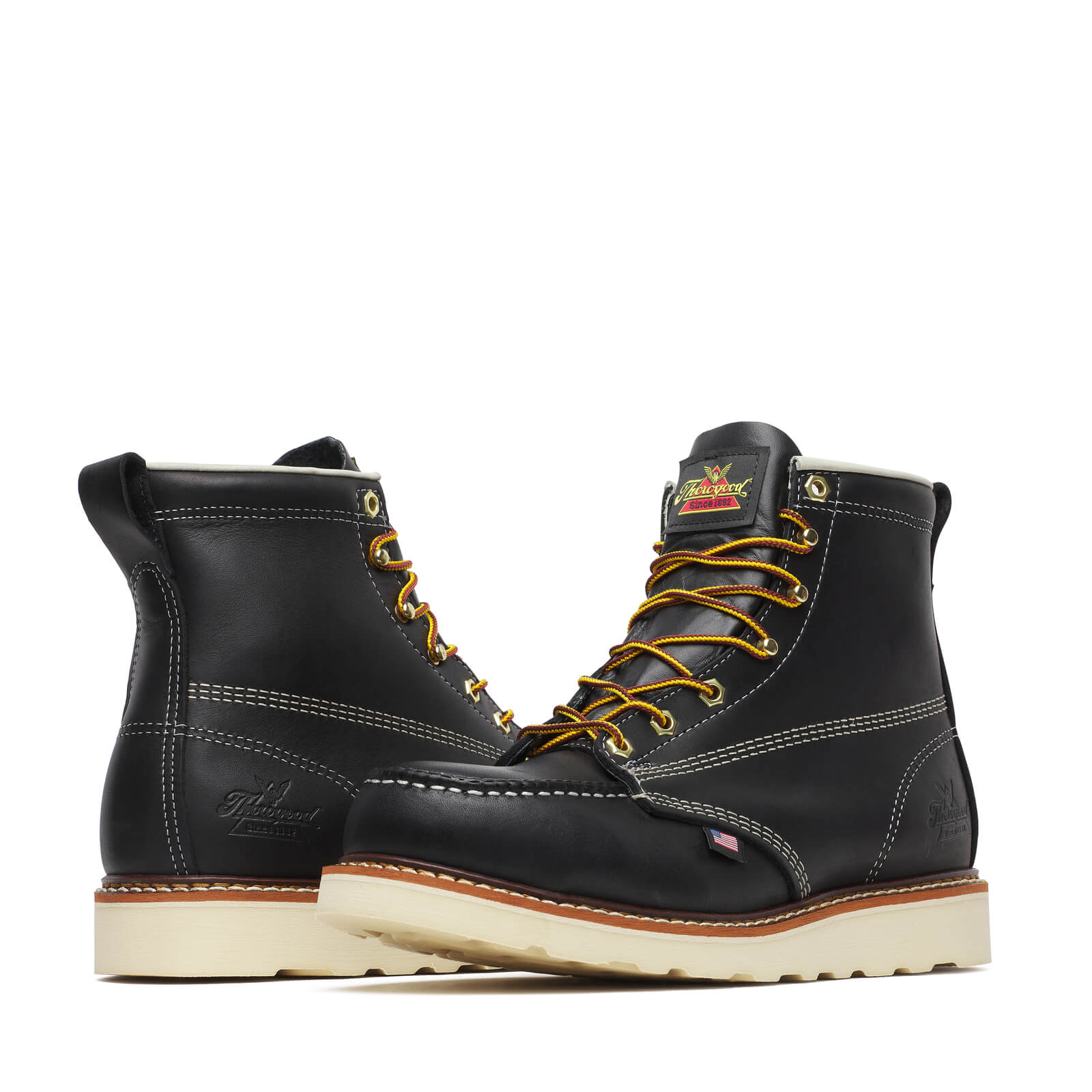 Close-up of 804-6201 6" Boots Black Boots showing Black leather work boot with cream contrast stitching, gold and black