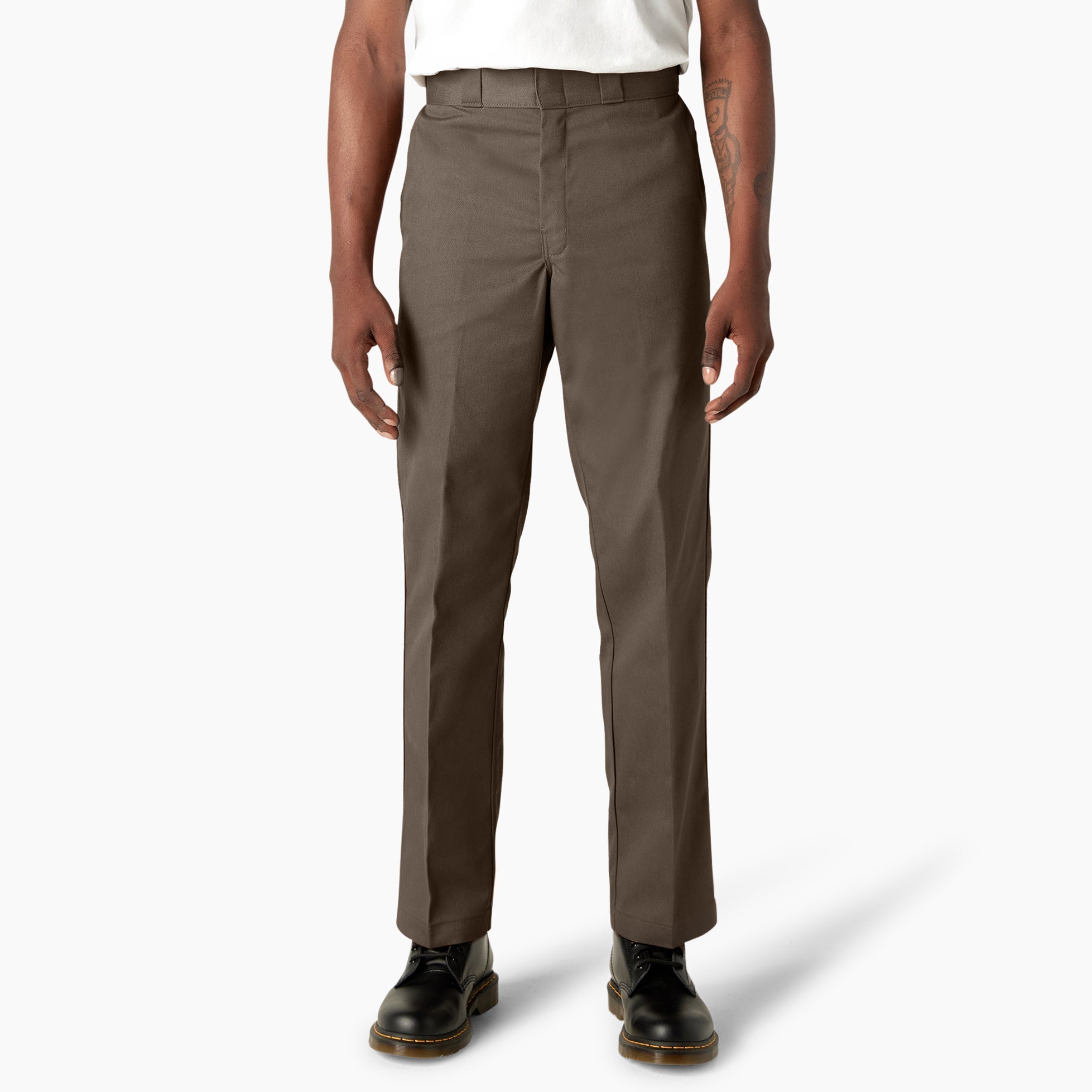 Person wearing 874 Original Work Pant Pants Black Pants, Olive work pants styled with white tank top and black leather boots