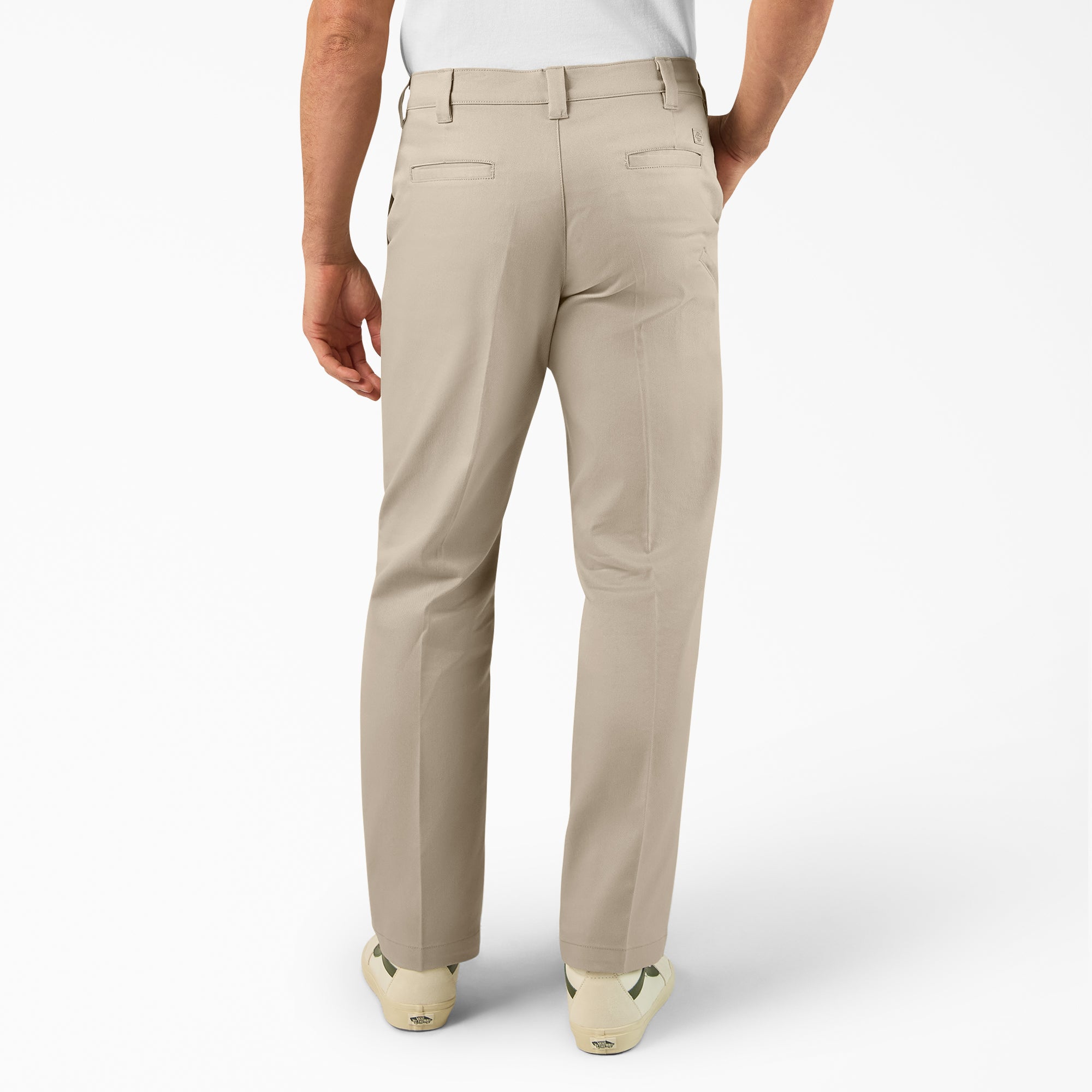 Person wearing 874 Pro Series Work Pant Pants Black Pants, Man standing against plain white background wearing khaki work