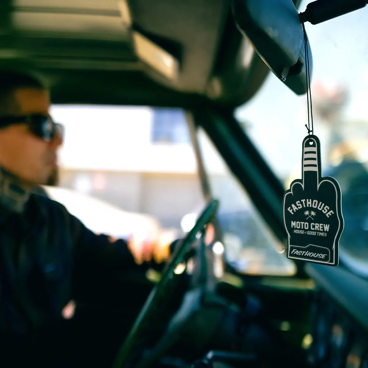 Close-up of Air Freshener Number One Accessory Vintage Gold Accessory showing Black foam hand-shaped air freshener with