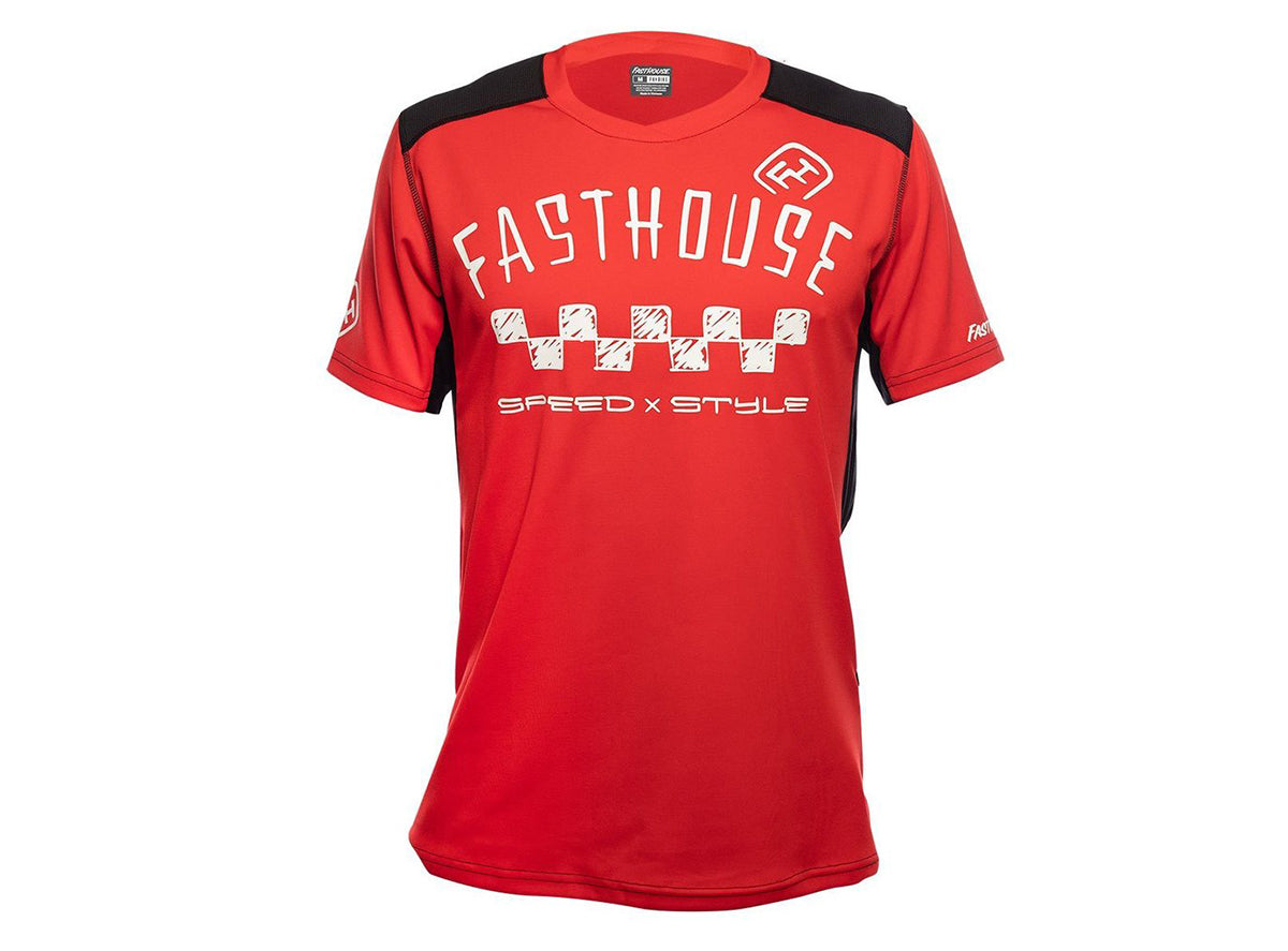 Alloy Nelson Youth Jersey front view, Red with black shoulder panels, white "Fasthouse" text, checkered flag graphic, and