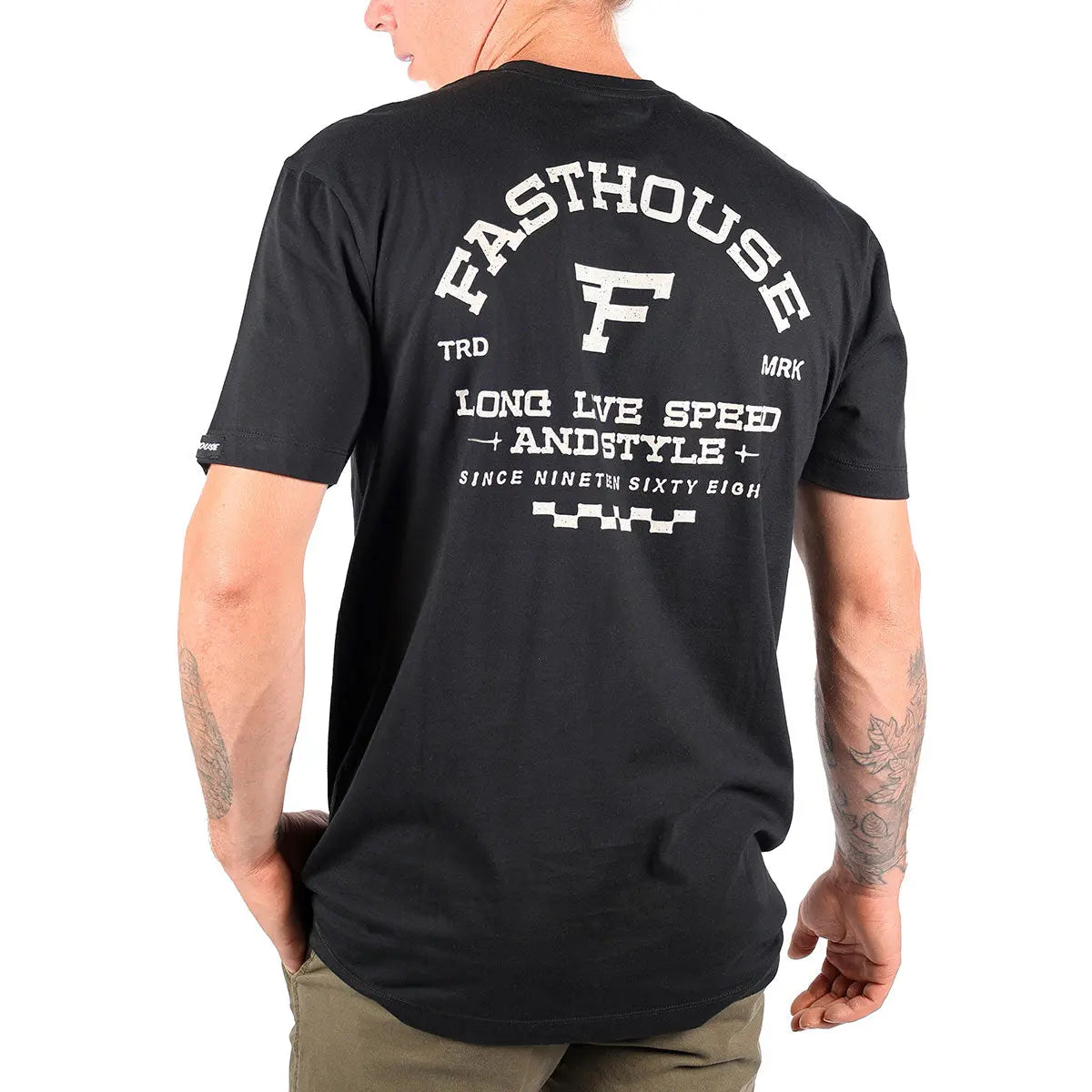 Person wearing Arthur Black Tee, Man wearing black tee against plain white background, shown from rear three-quarter view -