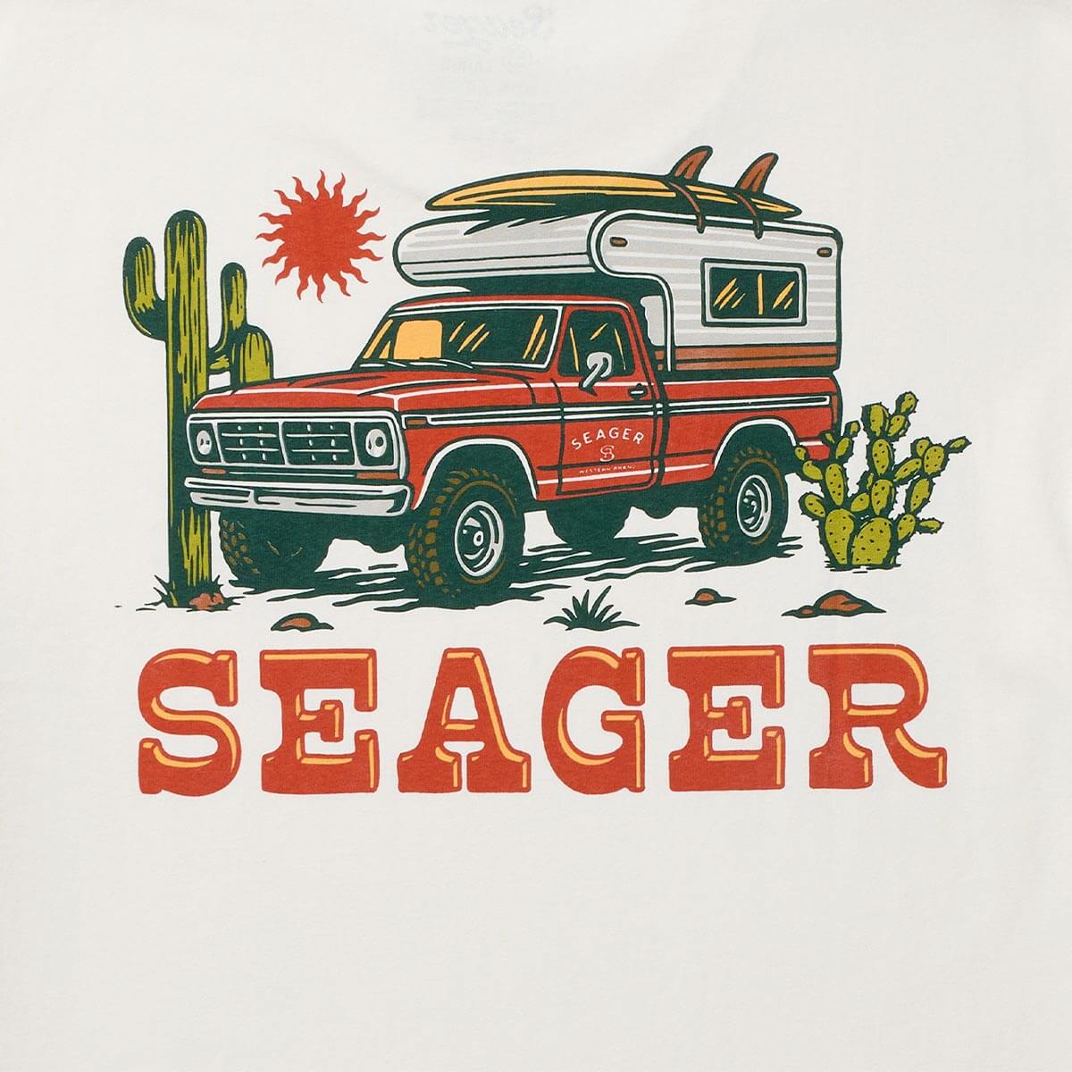 Close-up of Baja Vintage Black Tee showing Cream with red and green vintage truck graphic, surfboard, camper, cacti, and red