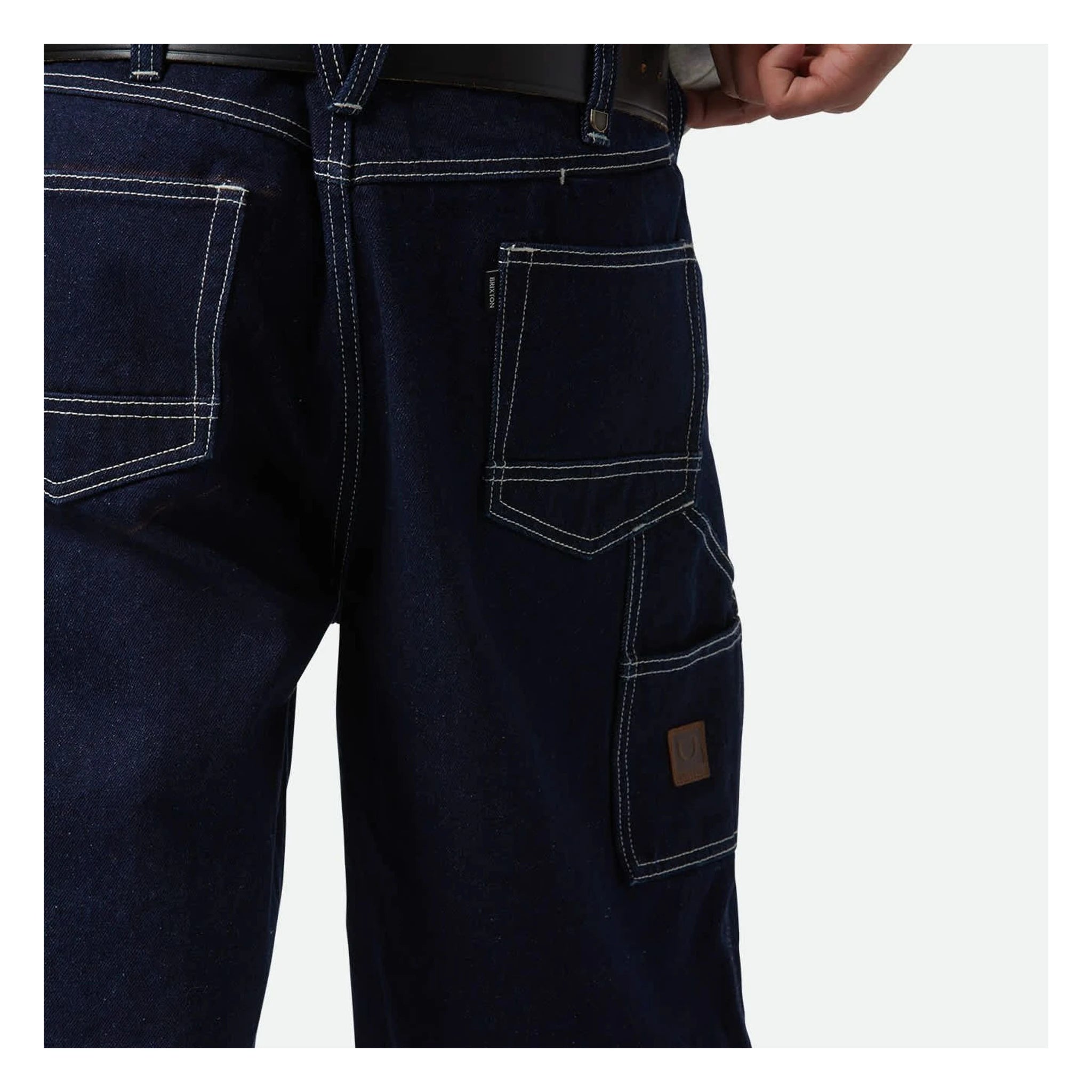 Close-up of Builders Carpenter Baggy Short Rinse Denim Shorts Shorts showing Contrast white topstitching on dark indigo