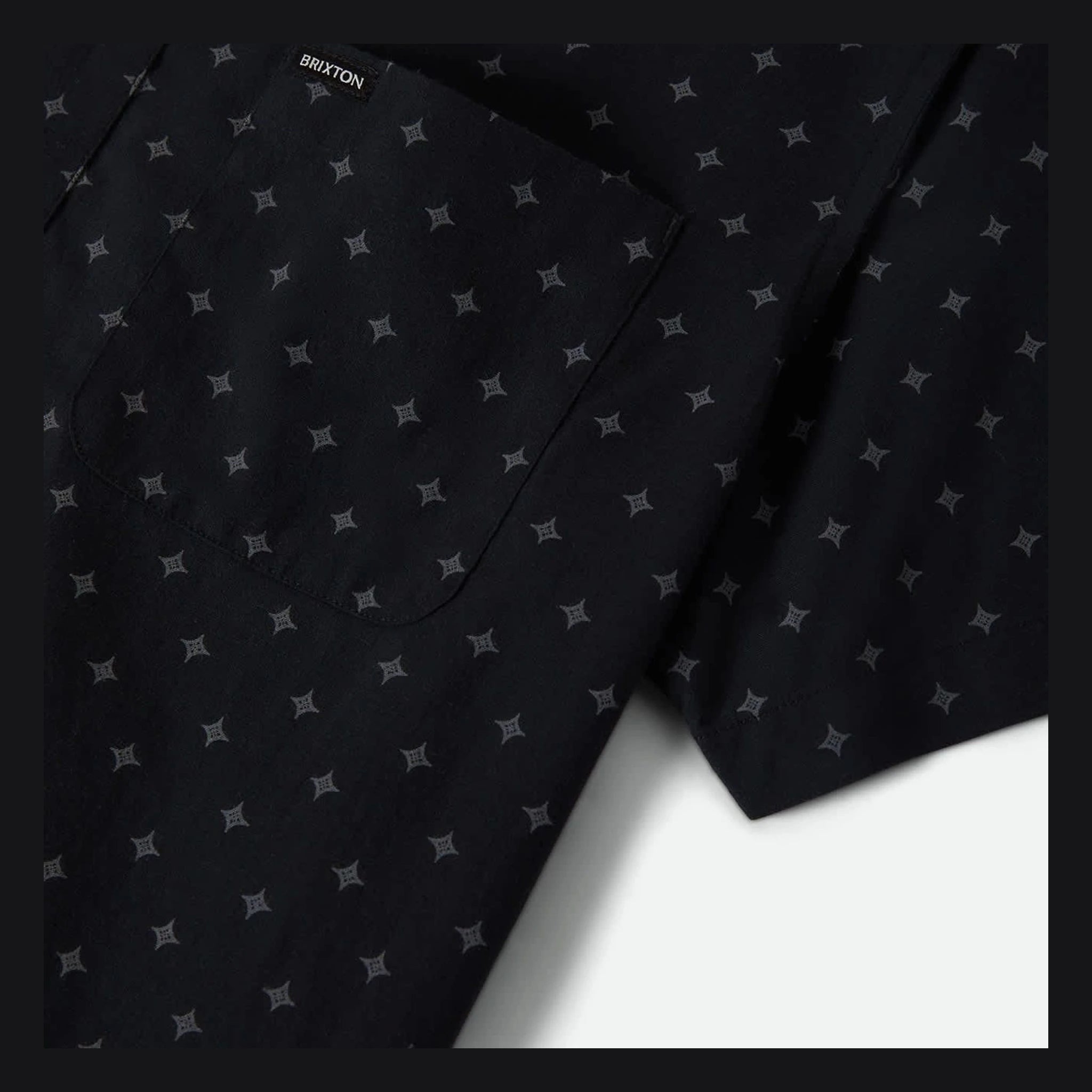Close-up of Charter Print SS Woven S/S Woven Future Grey/ Diamond Tile S/S Woven showing Black with charcoal four-point star