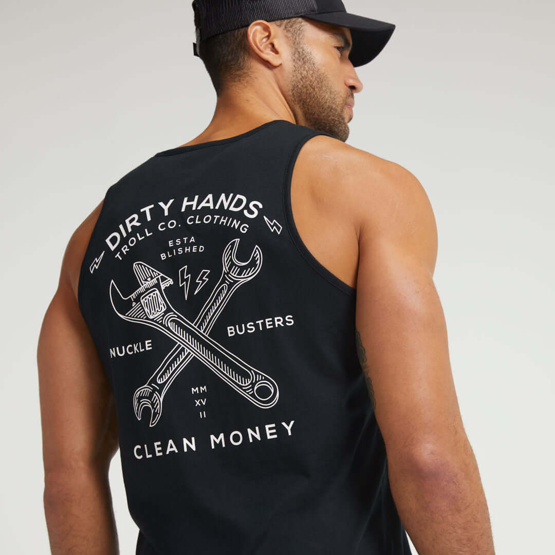 Person wearing DHCM Twisting Wrenches Tank Tank Top Black Tank Top, Man wearing black tank top against neutral studio