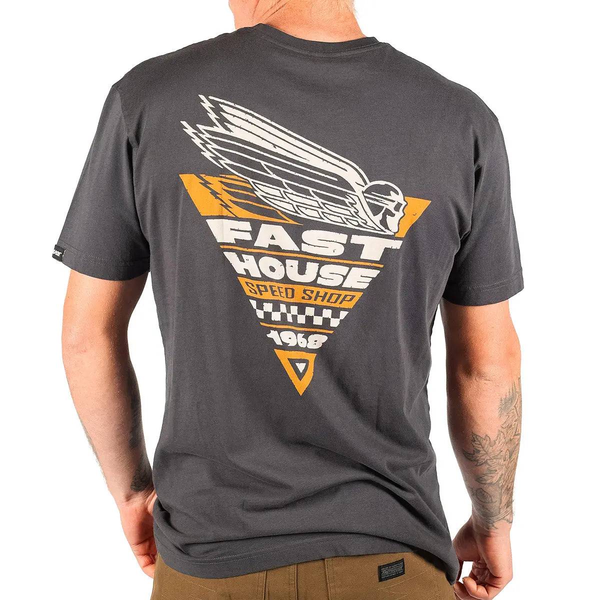 Person wearing Flyer White Tee, Man wearing charcoal tee standing against plain white background - Slowride Supply