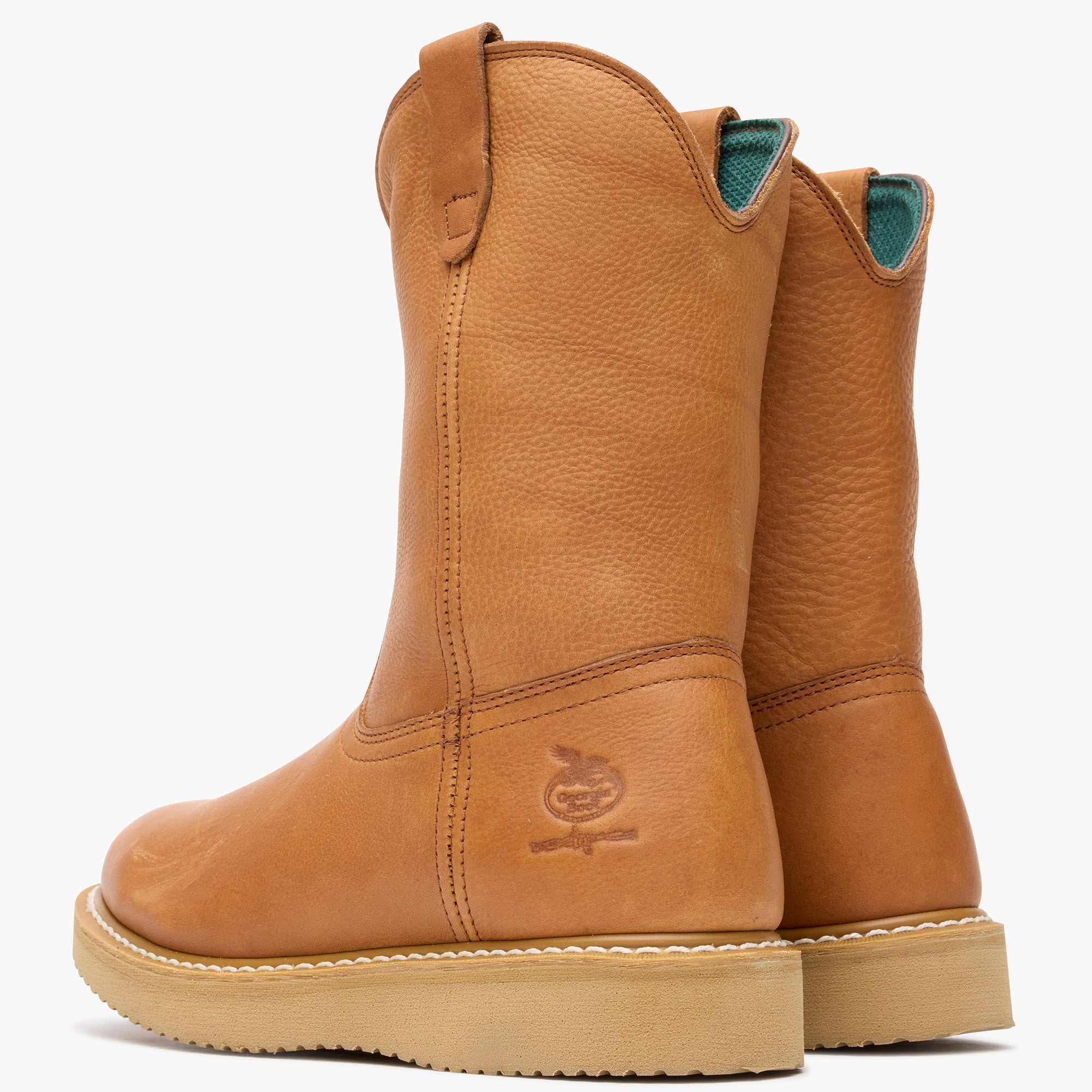 Close-up of G5353 10" ST Wellington Barracuda Boots Gold Boots showing Tan leather heel with embossed logo and teal mesh