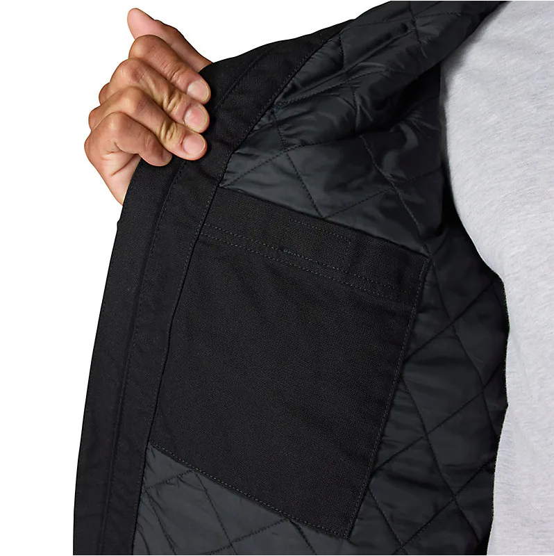Person wearing J130 Washed Duck Insulated Active Moss Jacket, Hand gripping open jacket pocket against white background -