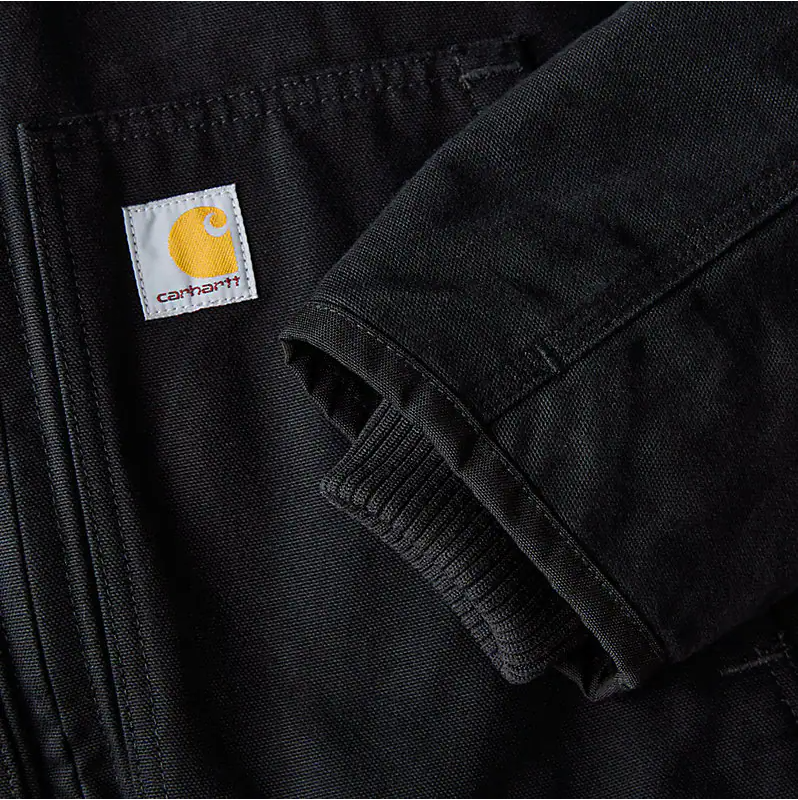 Back of J130 Washed Duck Insulated Active Moss Jacket, Blank back with woven brand label and ribbed knit cuff detail visible