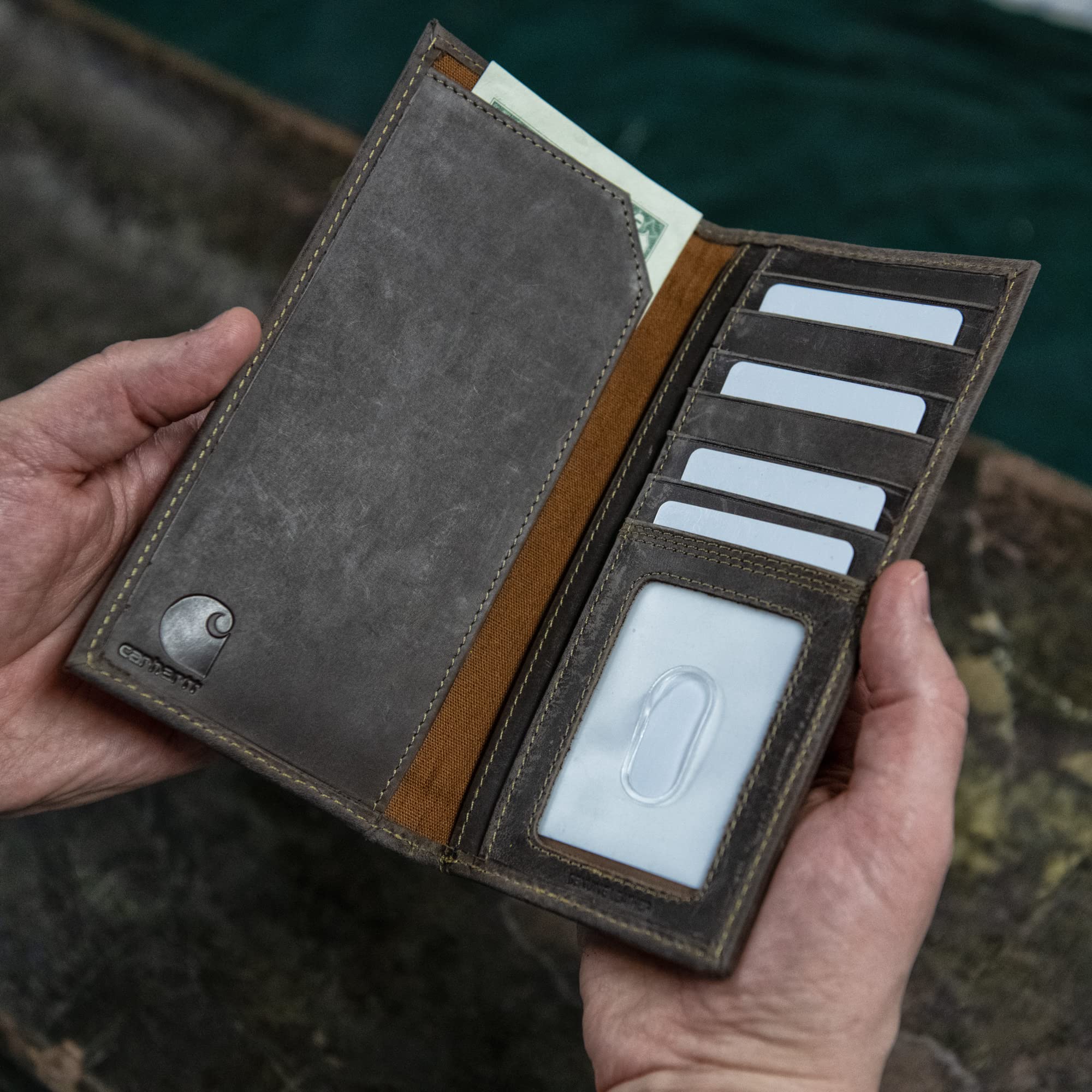 Person wearing Leather Triple Stitched Rodeo Wallet Accessory Black Accessory, Weathered leather wallet held open in hand