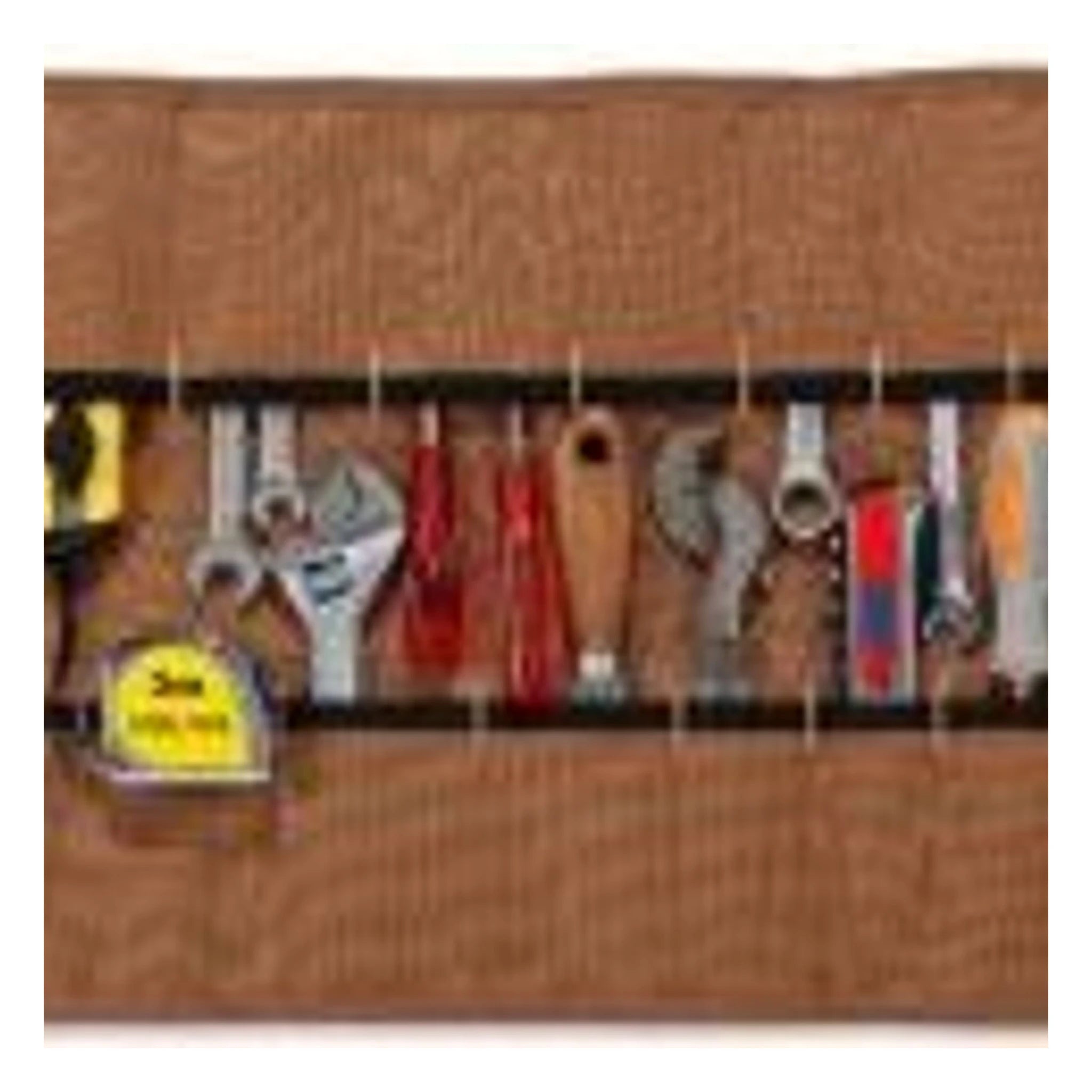 Close-up of Legacy Tool Roll Accessory Black Accessory showing Heavy canvas with brass grommets and hanging loops, aged