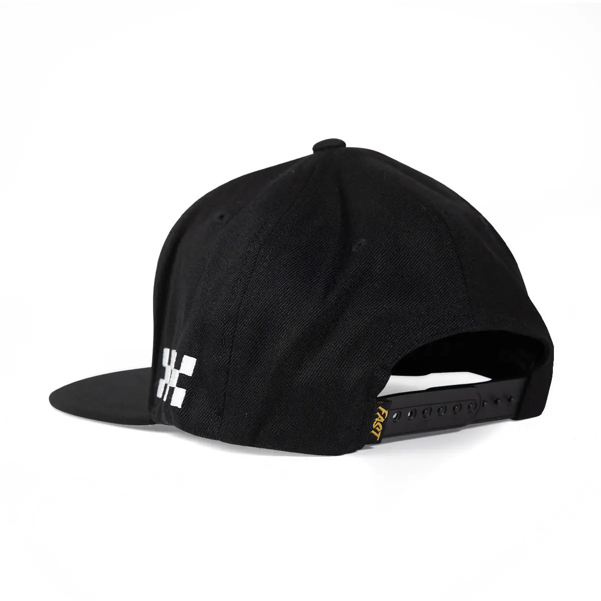 Close-up of Maintenance Hat Apparel Black Apparel showing Black six-panel cap with white geometric logo on side, snapback