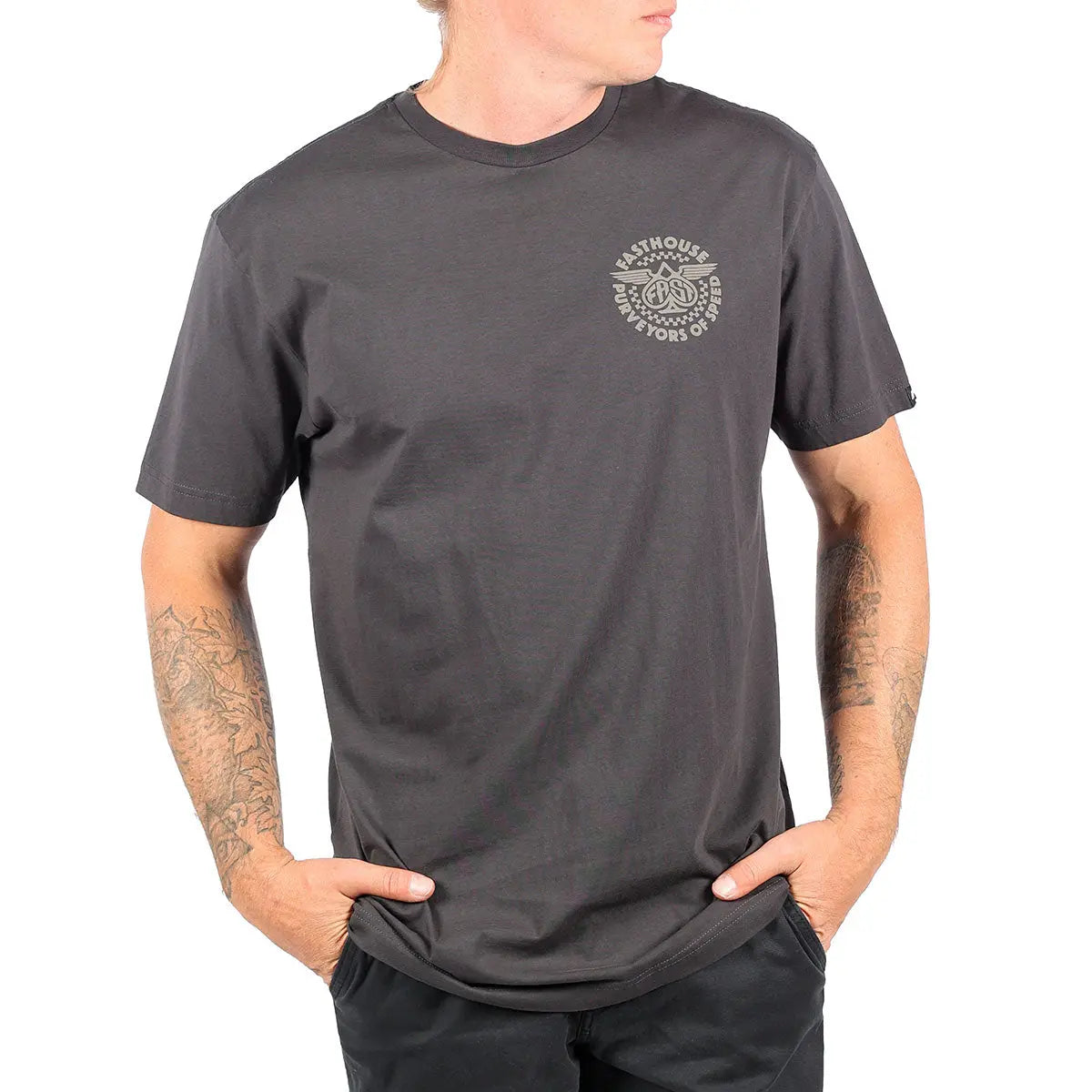 Person wearing Maverick Graphite Black Tee, Man wearing graphite tee with small chest graphic against white studio