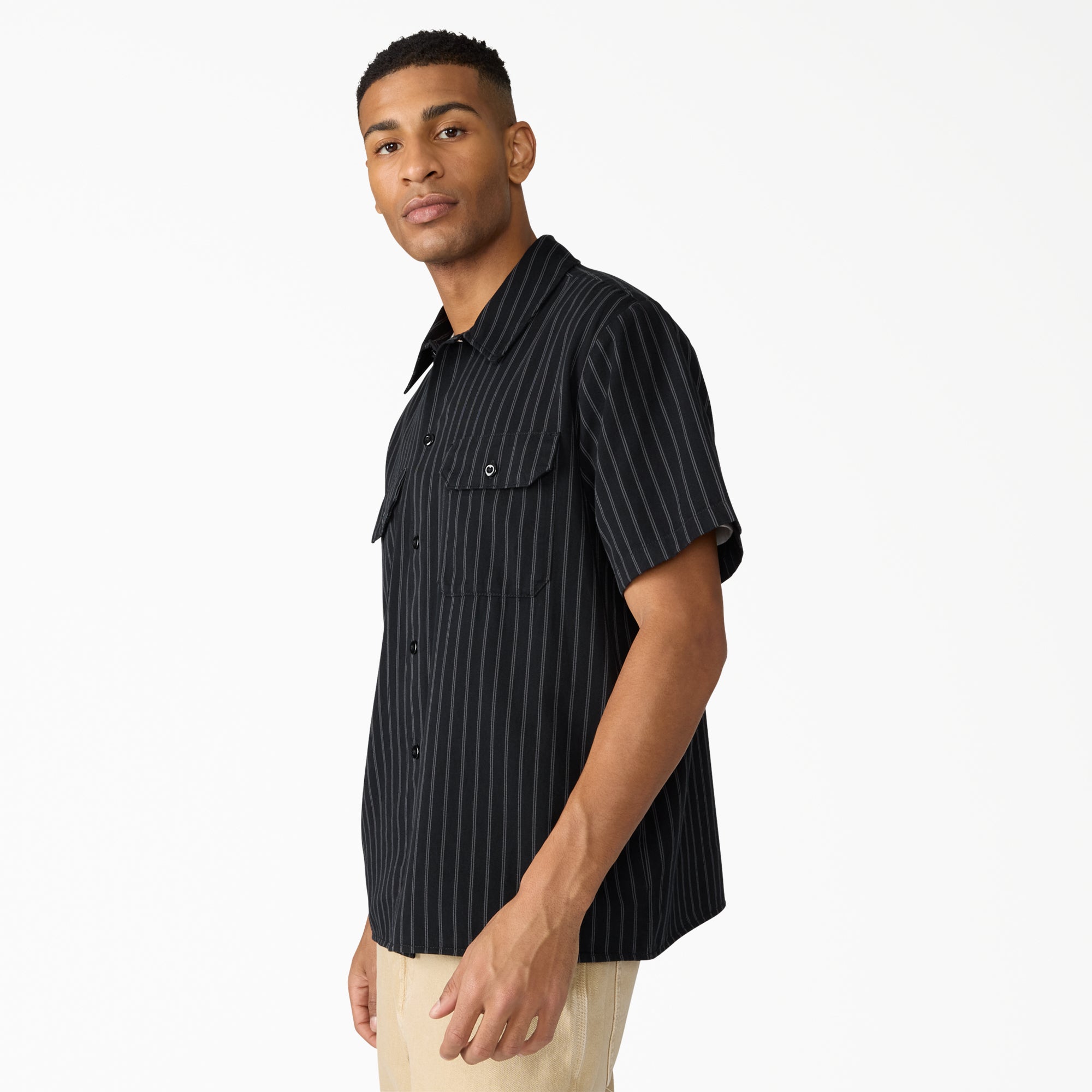 Person wearing Mens Worn in Lightweight Work Shirt S/S Woven Black S/S Woven, Man in black pinstripe shirt posed against