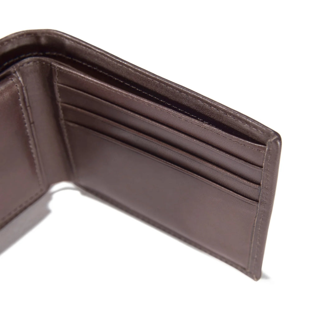Close-up of Oil Tan Leather Passcase Wallet Accessory Accessory showing Brown leather interior with card slots and bill