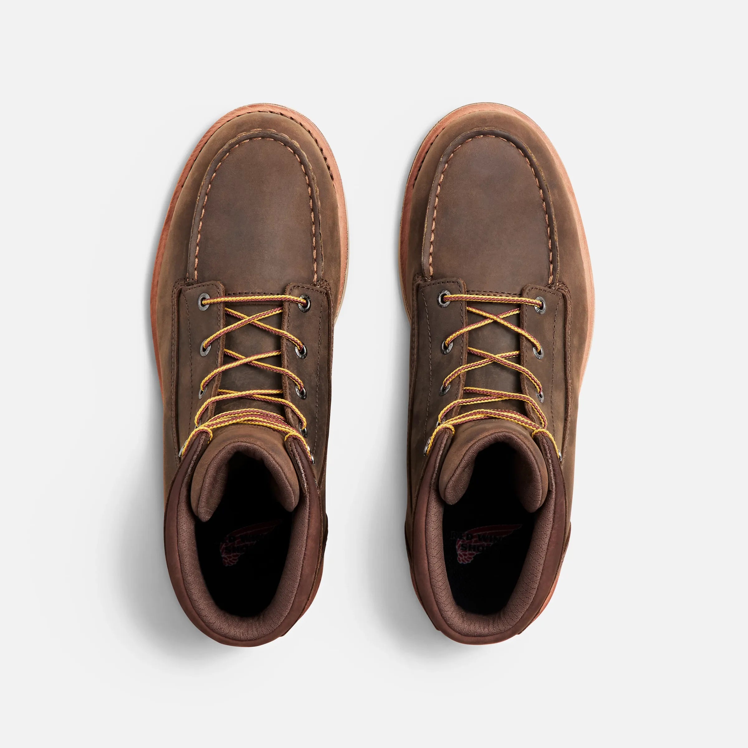Back of 2440- Traction Tred Lite Boots Boots, Dark brown leather boot interior with visible logo stamp on tongue - Slowride