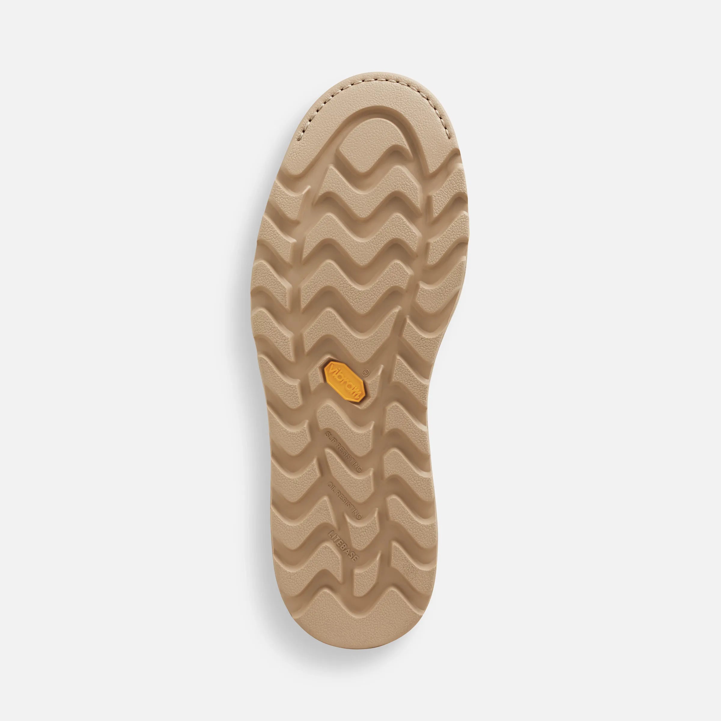 Close-up of 2440- Traction Tred Lite Boots Boots showing Tan rubber sole with wavy tread pattern and gold logo medallion -