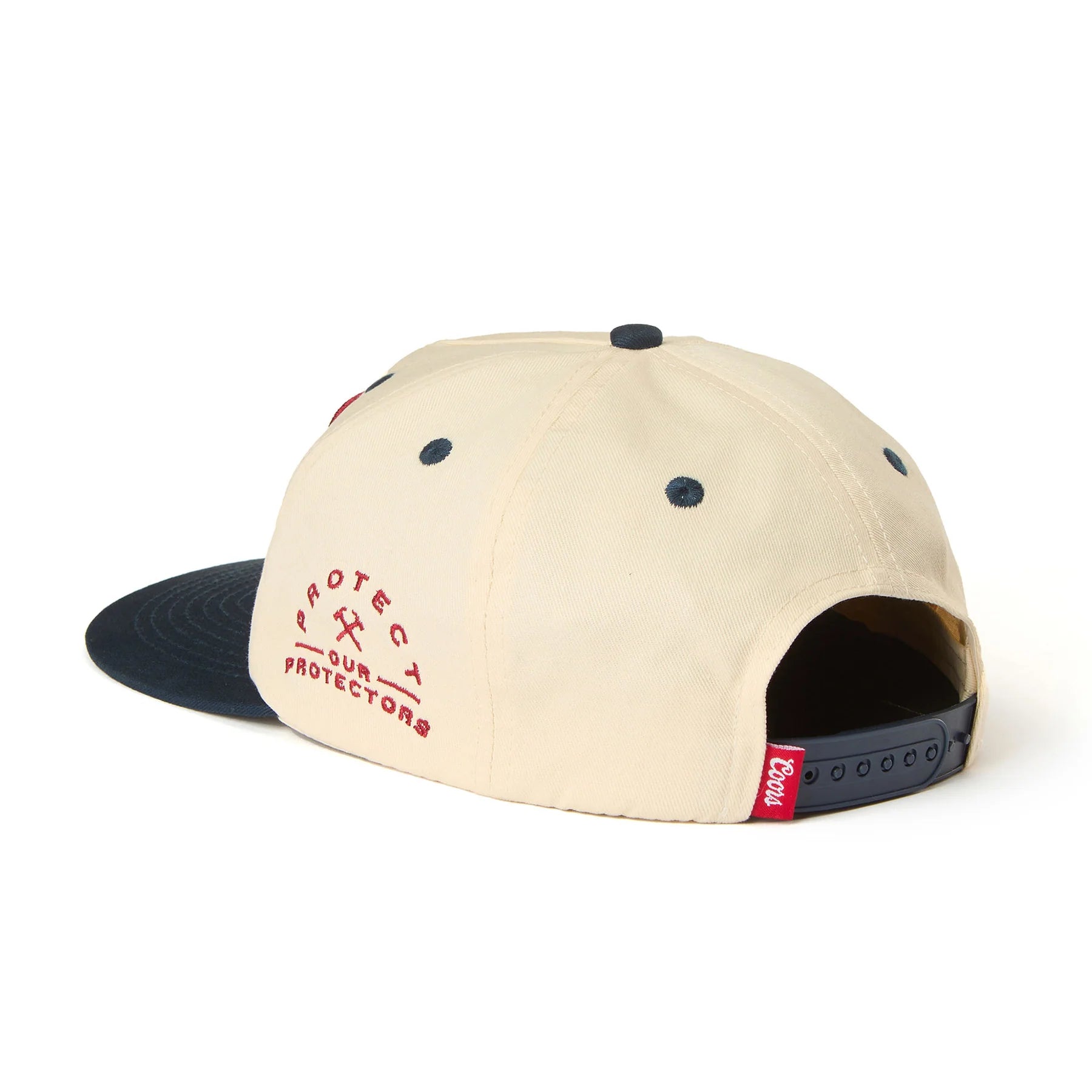 Close-up of X Coors Banquet P.o.p. Snapback Cream/navy-cream/navy Hat showing Cream crown with navy blue eyelets and navy