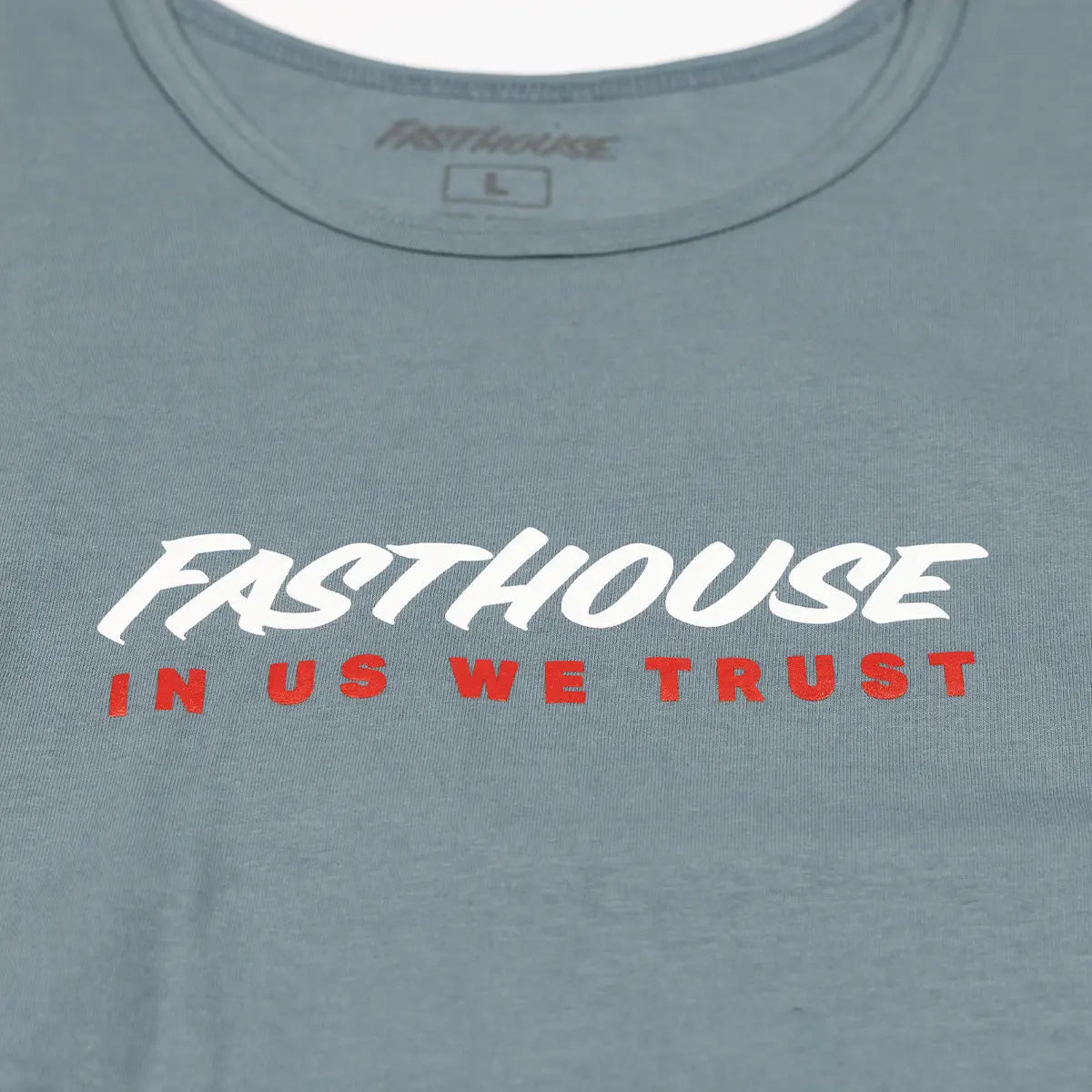 Close-up of Trust Tank Apparel Indigo Apparel showing White italic script with red block lettering below, printed on crew