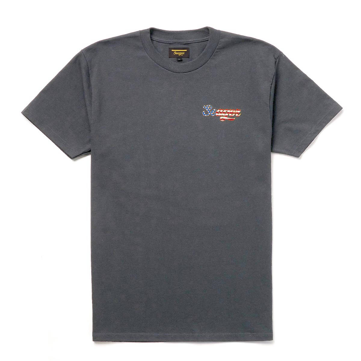 Close-up of USA Russ Vintage Black Tee showing Charcoal gray tee with small embroidered flag and script logo on chest -