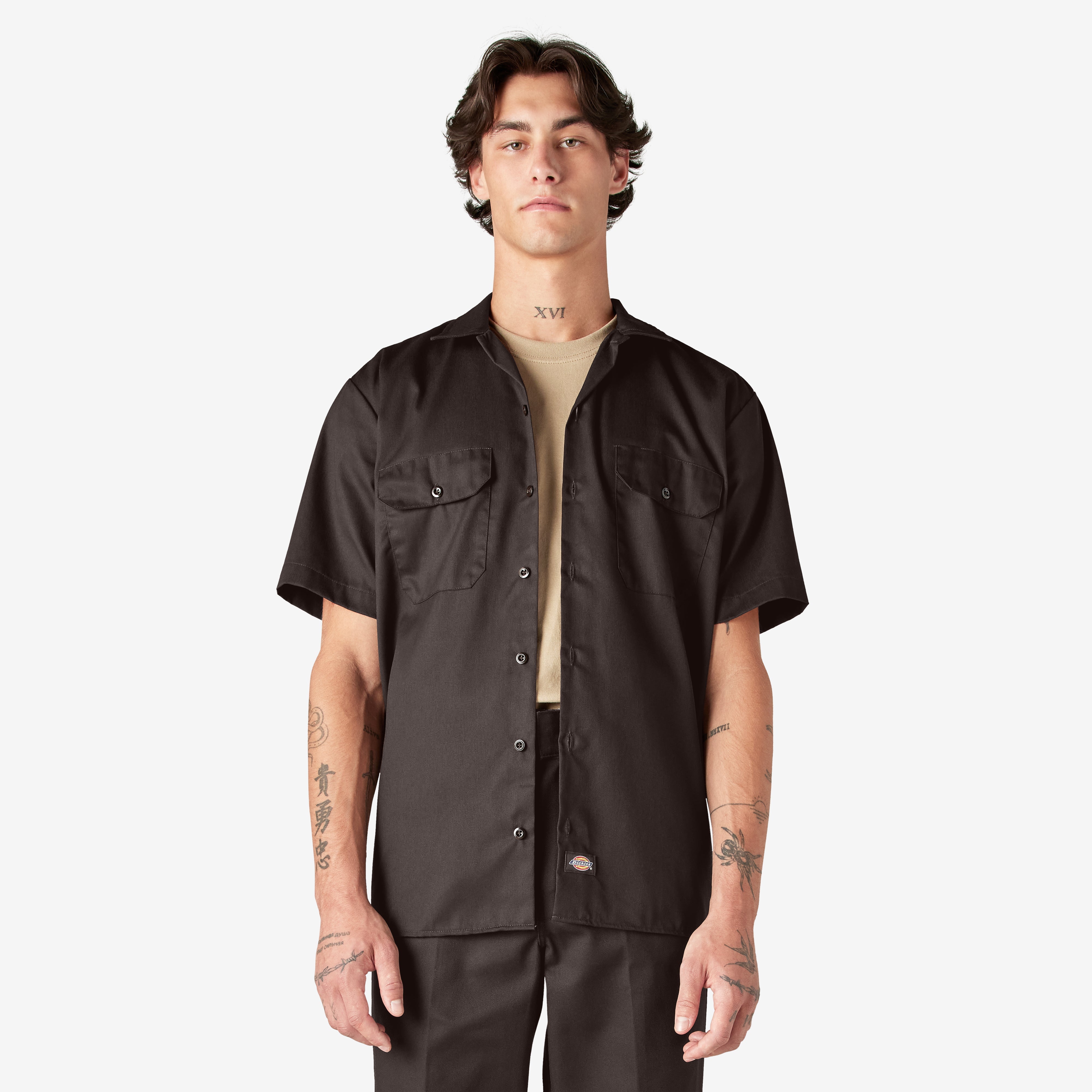 Person wearing Woven Twill Shirt S/S Woven Black S/S Woven, Man wearing black short-sleeve work shirt against plain white