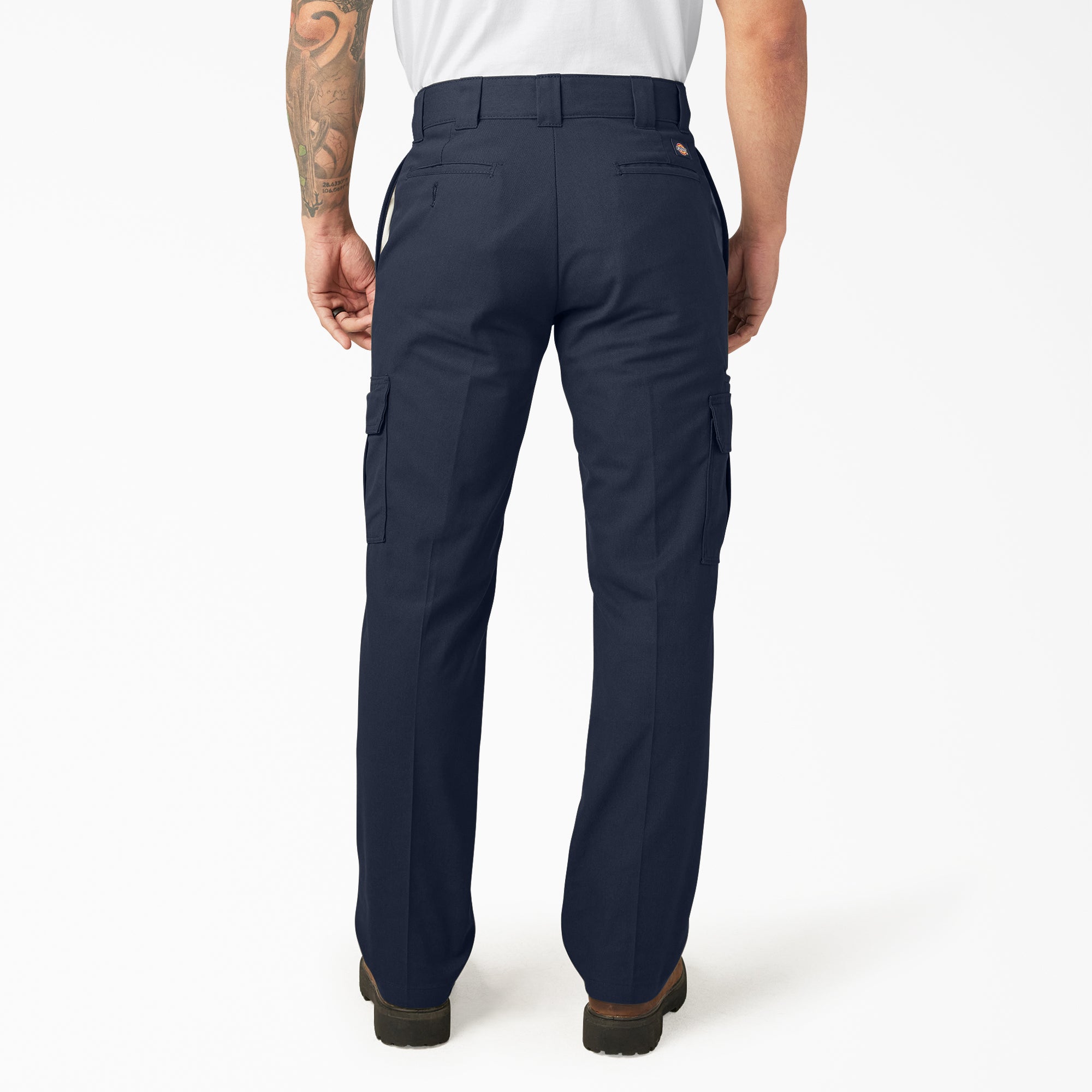 Person wearing Wp595 Cargo Pant Regular Fit Pants Black Pants, Man standing against white backdrop wearing navy cargo pants