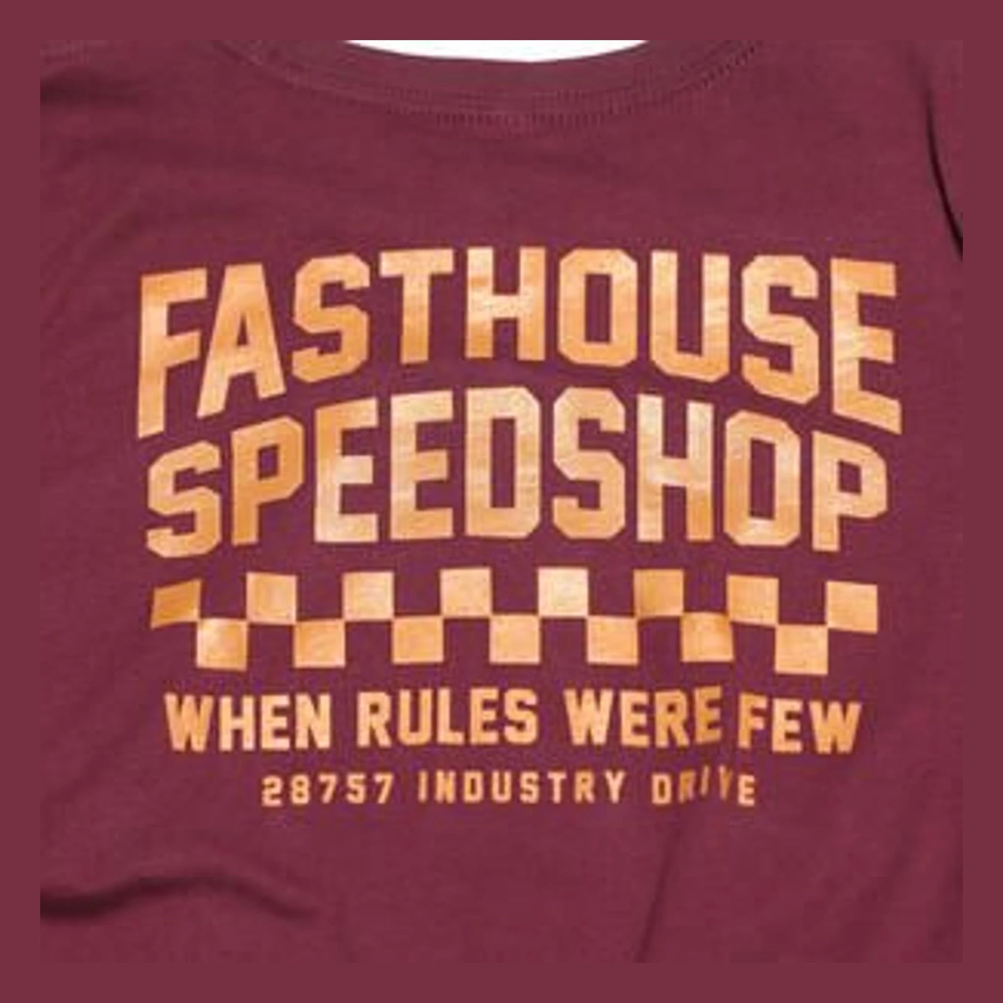 Close-up of Youth Chatlet Tee Kids Maroon Kids Tee showing Gold block lettering and checkered flag graphic printed on maroon