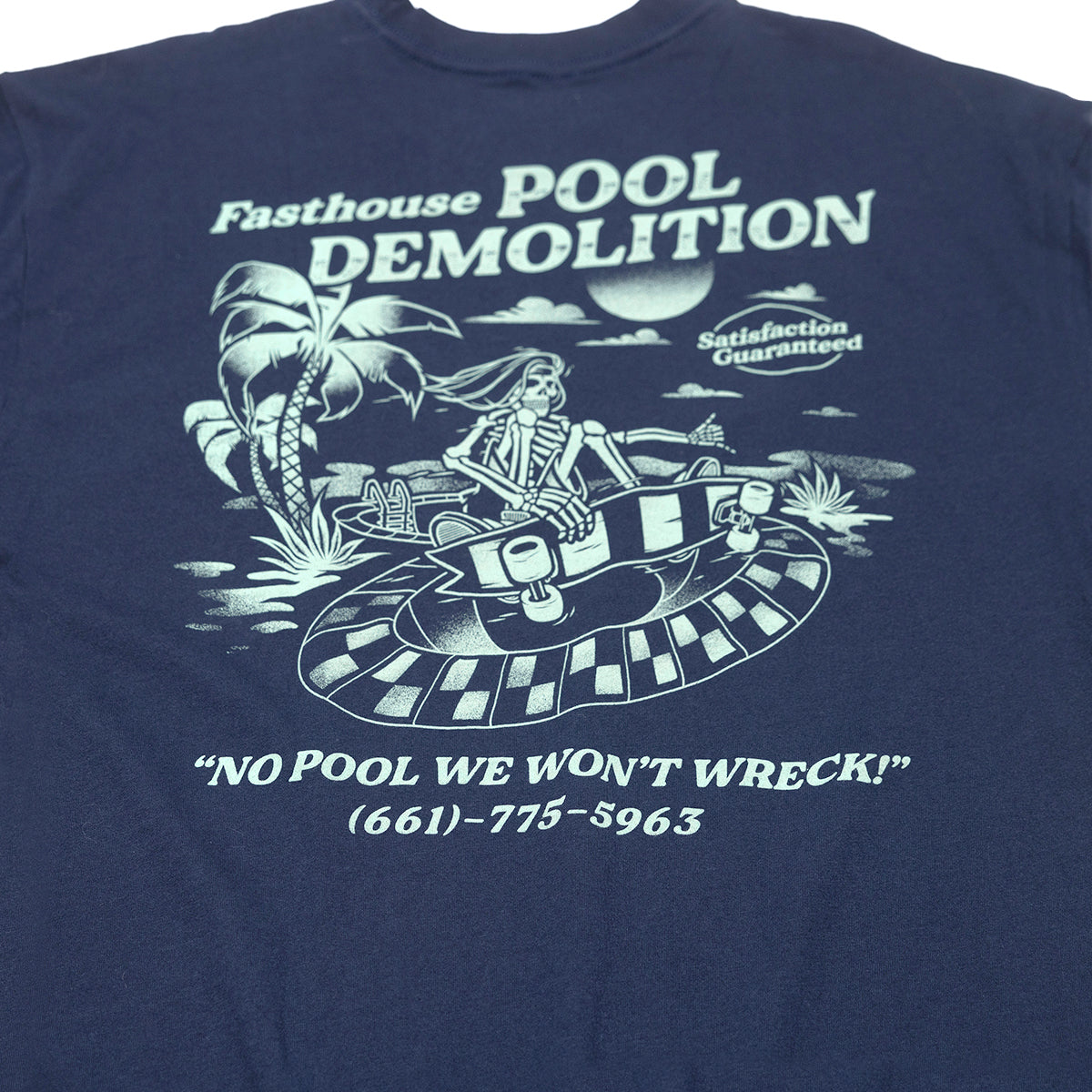 Close-up of Youth Demolition Tee Kids Navy Kids Tee showing Navy with pale green illustration of skeleton driver in vintage