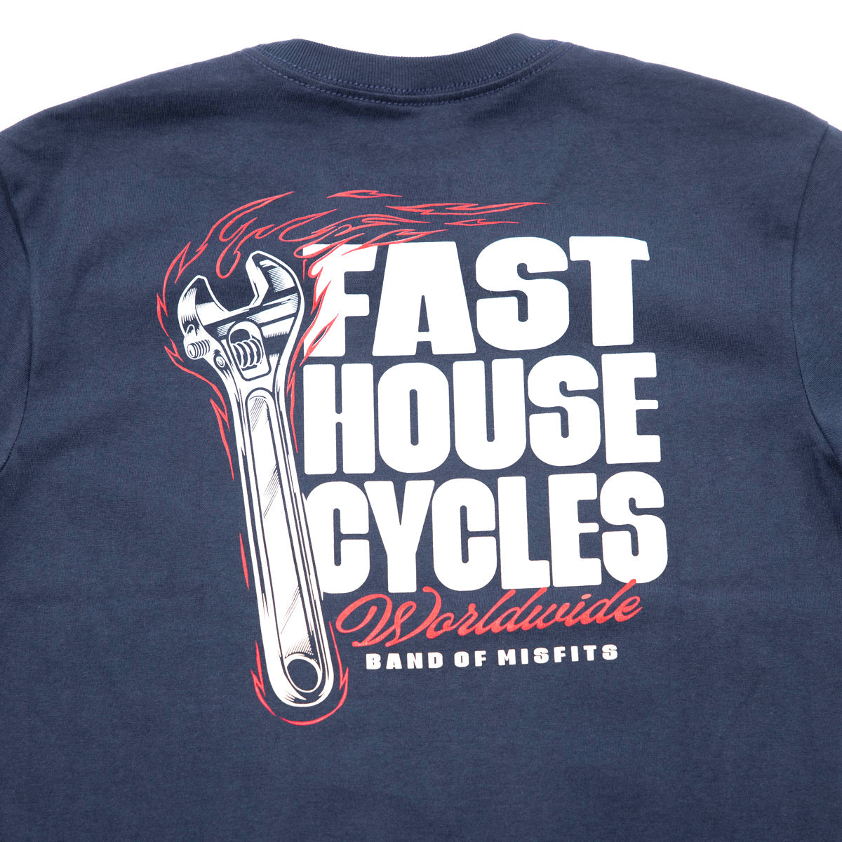Close-up of Youth Spanner Tee Kids Midnight Navy Kids Tee showing White wrench with red flame detail, white block text