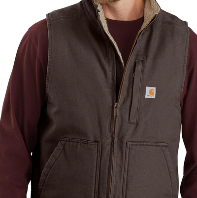 Person wearing 104277 Mock Neck Sherpa Lined Vest Dark Brown Vest, Dark brown vest with sherpa lining worn over burgundy