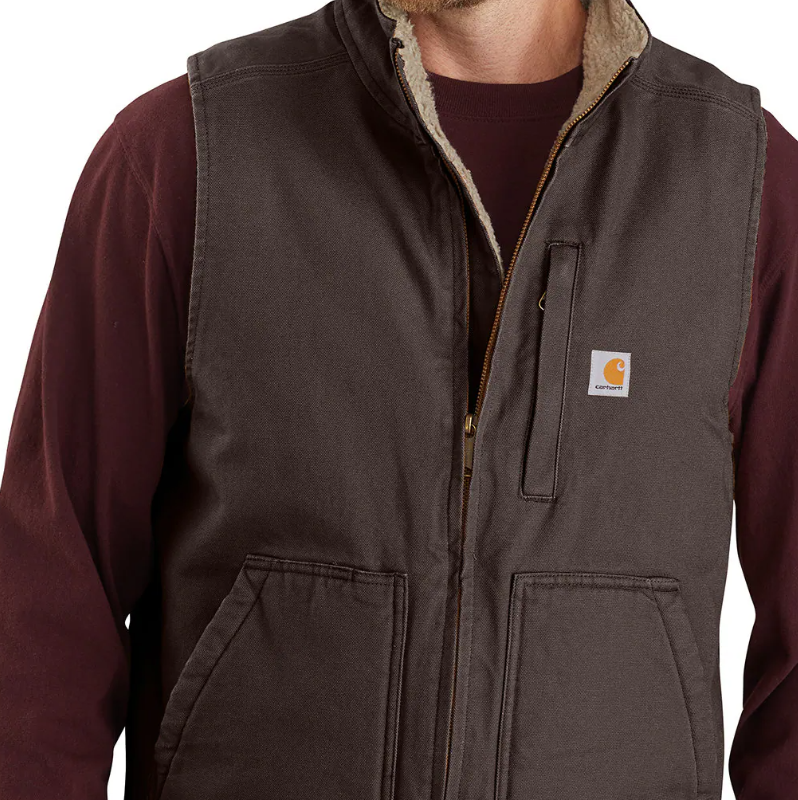 Person wearing 104277 Mock Neck Sherpa Lined Vest Dark Brown Vest, Dark brown vest with sherpa lining worn over burgundy
