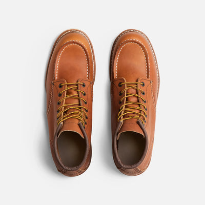 Back of 10875- Traction Tred Boots Boots, Tan leather boot with contrasting white stitching and yellow laces from above -
