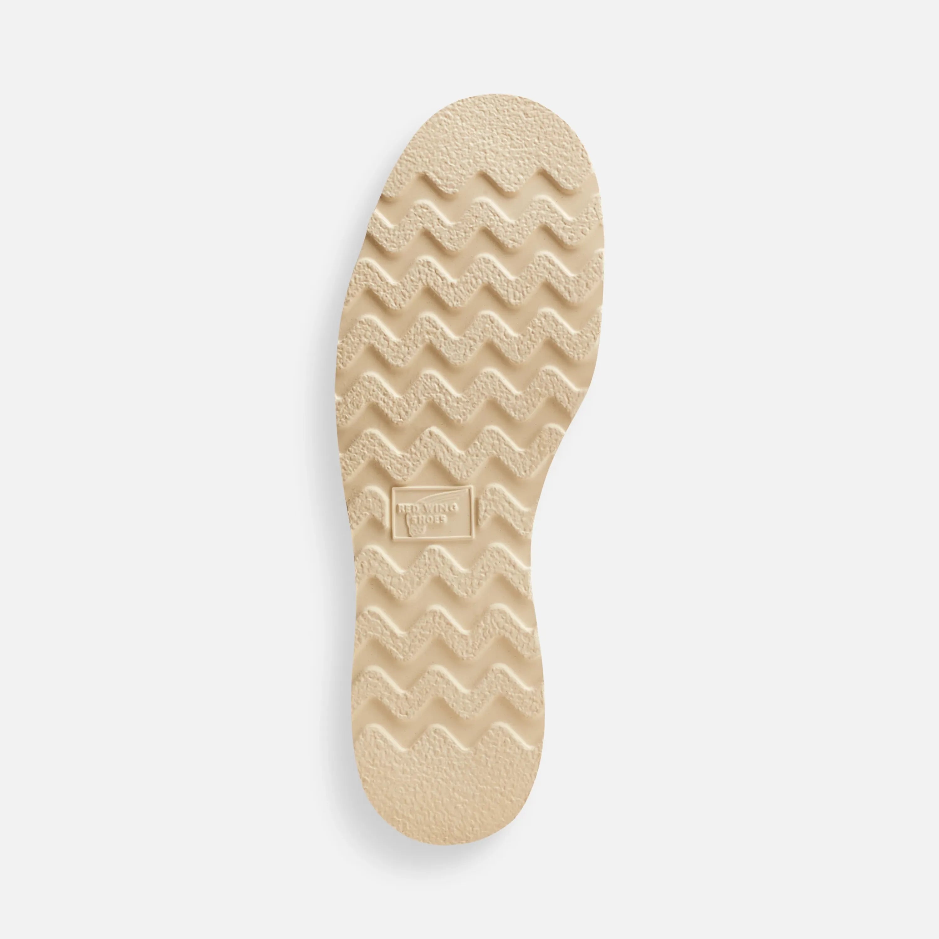 Close-up of 10877- Traction Tred 8-inch Boot Boots Boots showing Cream rubber sole with wavy tread pattern and embossed