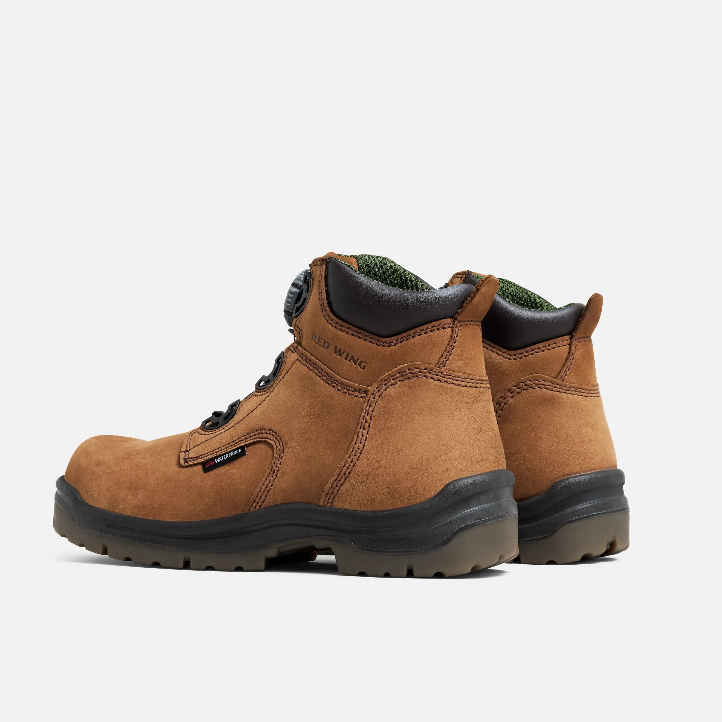 Close-up of 2298- King Toe Boots Boots showing Tan nubuck leather upper with black lug sole and dark collar lining, visible