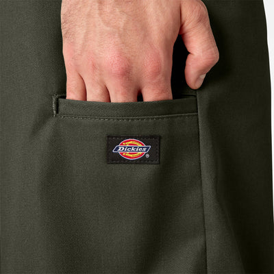 Person wearing 42283 13" Loose Fit Work Short Shorts Silver Shorts, Olive work shorts worn by a person with hand in front