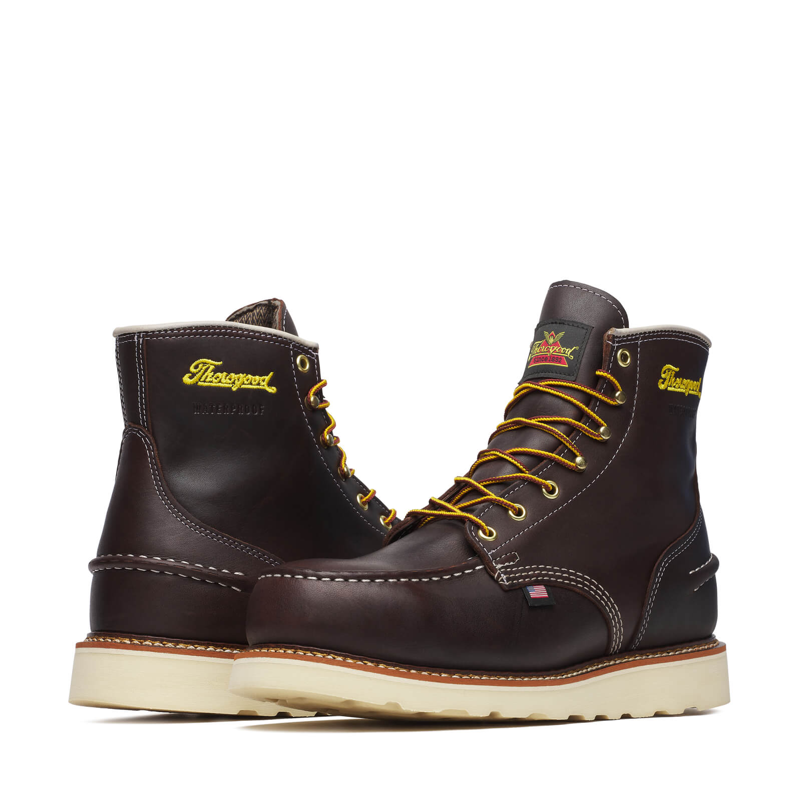 Close-up of 804-3600 6" Briar Pitstop Boot Boots Boots showing Cream and tan contrast stitching on dark brown leather,