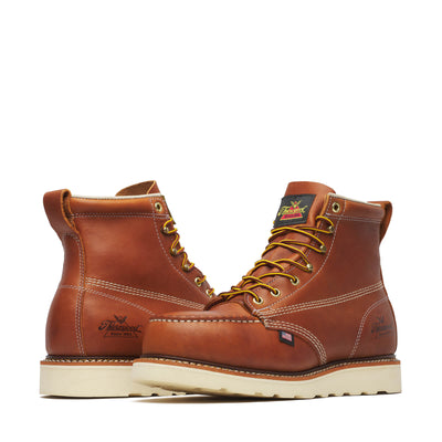 Close-up of 804-4200 6" Tobacco Boots Boots showing Tan leather work boots with cream stitching, gold laces, and cream