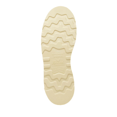 Close-up of 804-4200 6" Tobacco Boots Boots showing Cream rubber sole with wavy tread pattern and embossed branding marks -