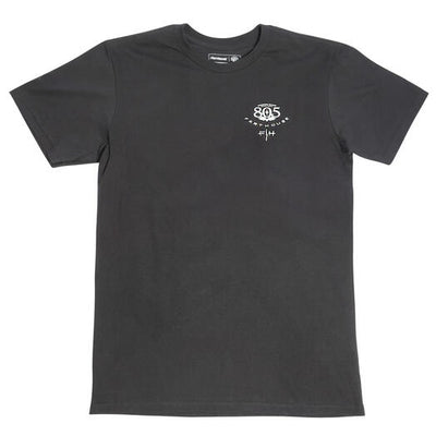 Close-up of 805 Desert Run Black Tee showing Black tee with small white chest graphic featuring 805 numeral and decorative