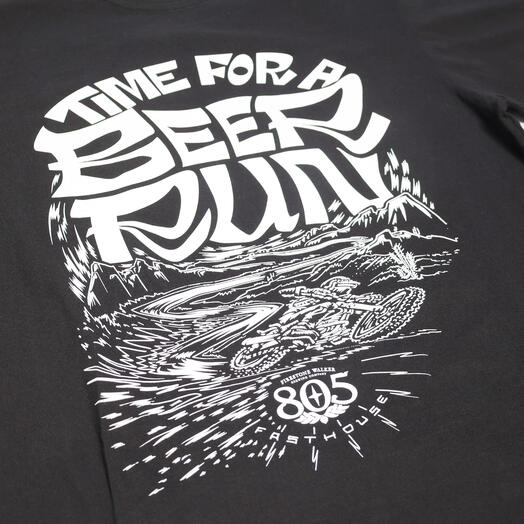 Close-up of 805 Desert Run Black Tee showing White ink screen print showing desert landscape with radiating lines and "805"