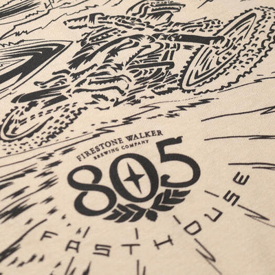 Close-up of 805 Desert Run Black Tee showing Black ink halftone racing graphic with Firestone Walker 805 logo and radiating