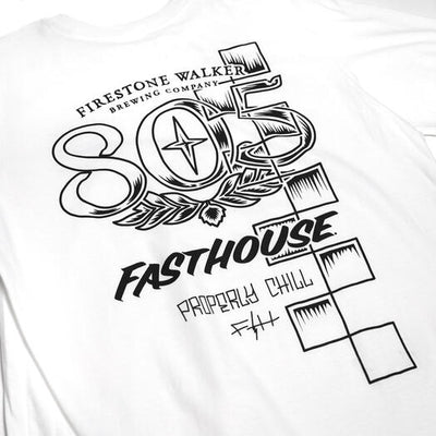 Close-up of 805 Luster White Tee showing Black line art graphic with brewery name, vintage hop leaf motif, numbered design,