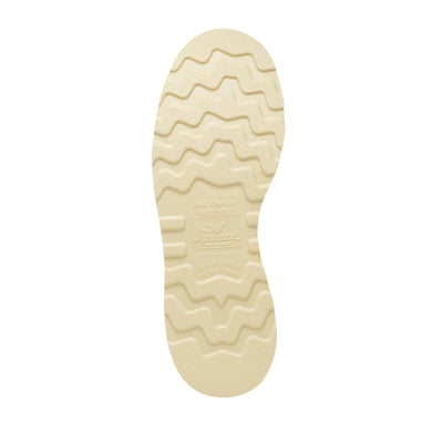 Close-up of 814-4200 6" Tobacco Boots Boots showing Cream rubber sole with wavy tread pattern and embossed branding details