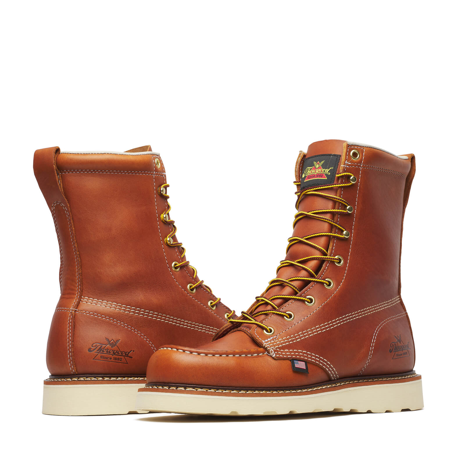 Close-up of 814-4201 8" Boots Tobacco Boots showing Cognac leather lace-up boots with contrast cream sole and gold eyelets,