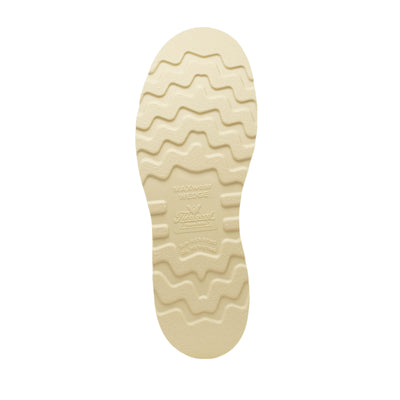 Close-up of 814-4208 Wellington Wedge Boots Tobacco Boots showing Cream rubber sole with wavy tread pattern and embossed