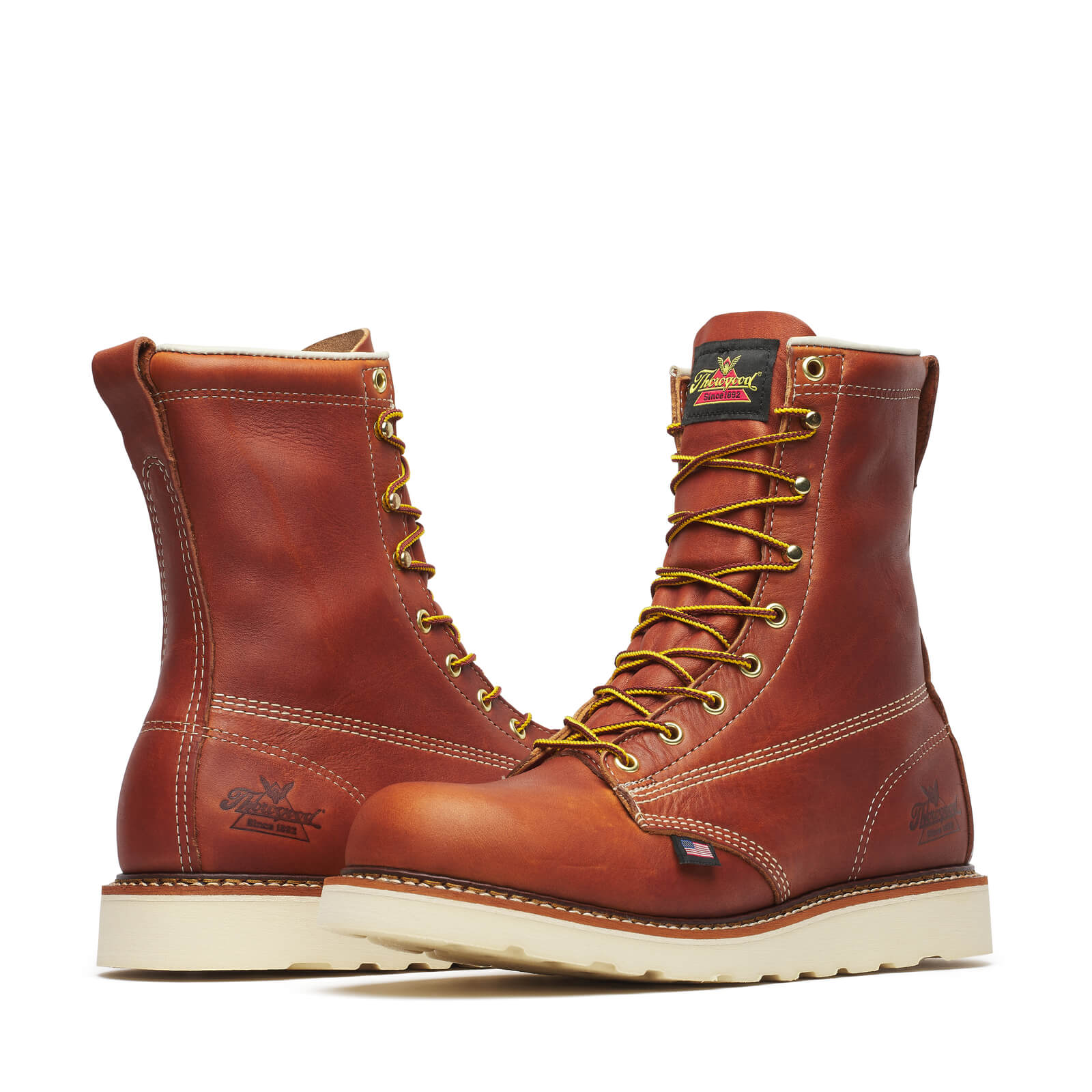 Close-up of 814-4364 8" Boots Tobacco Boots showing Rust-brown leather with cream stitching, yellow and red laces, cream