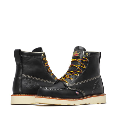 Close-up of 814-6201 6" Black Boots Boots showing Black leather with white contrast stitching, gold eyelets, and yellow-gold