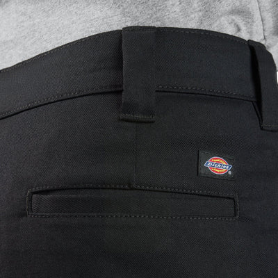 Close-up of 874 Pro Series Work Pant Pants Black Pants showing Black twill fabric with visible waistband stitching and woven